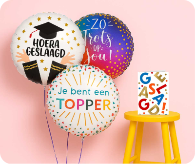 Een ballon met de tekst 'zo trots op jou!'