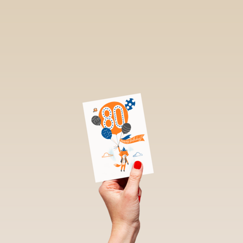een vos met ballon om 80 jaar te vieren