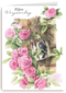 vogel in vogelhuisje tussen rozen