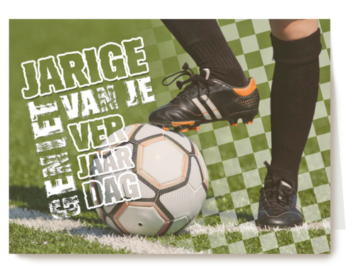 voeten met voetbal