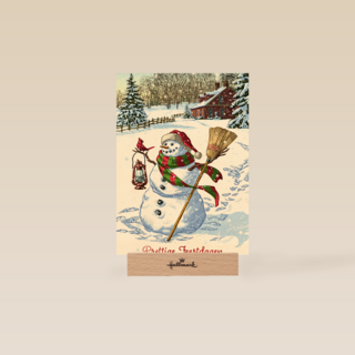 Kerstkaart sneeuwpop in sneeuw prettige feestdagen