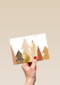 zakelijke kerstkaart met gouden kerstbomen