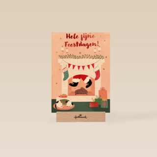 kerstkaart met kerstman in de schoorsteen