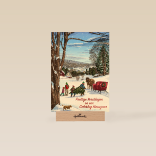 Klassieke kerstkaart met winter tafereel rendier