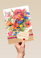 boeket met kaartje hartelijk gefeliciteerd