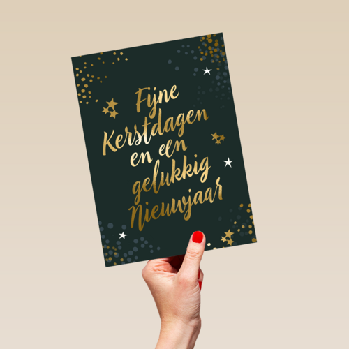 kerstkaart met gouden tekst op groen