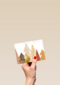 zakelijke kerstkaart met gouden kerstbomen