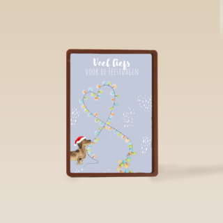 kerstkaart met hond en kerstverlichting