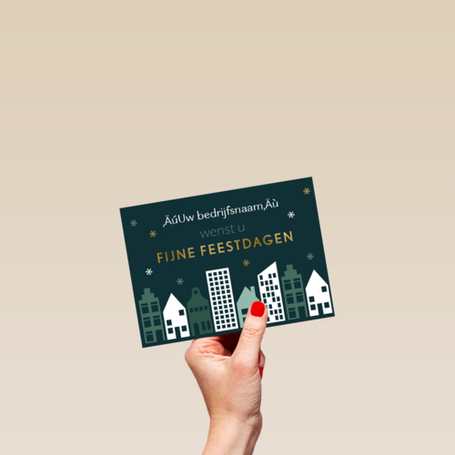 kerstkaart met een stad tijdens de nacht