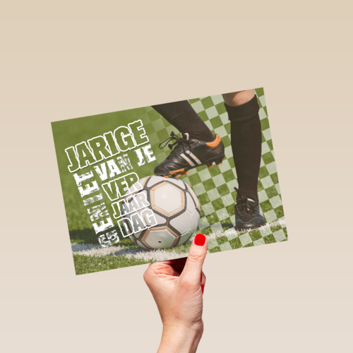 voeten met voetbal