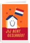 Geslaagd Huis met Nederlandse vlag