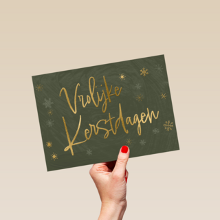 kerstkaart met gouden tekst op groene achtergrond