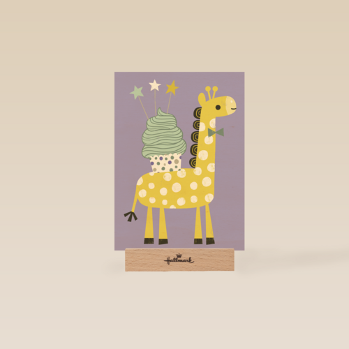 giraffe met cupcake