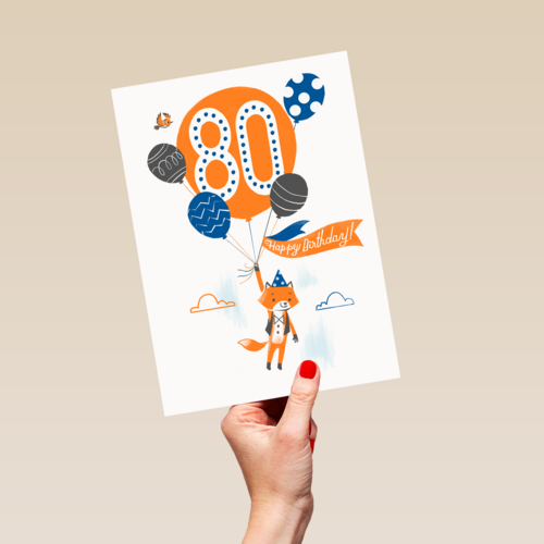 een vos met ballon om 80 jaar te vieren
