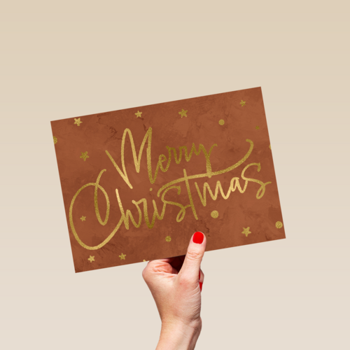 kerstkaart met gouden tekst en sterren