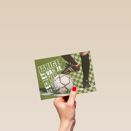voeten met voetbal