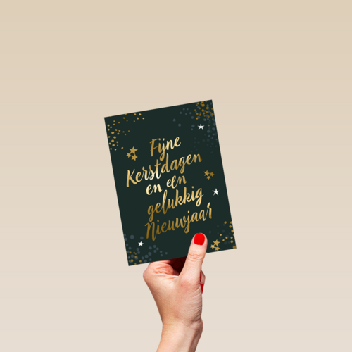 kerstkaart met gouden tekst op groen