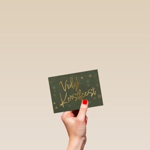 vrolijk kerstfeest in gouden letters op groen