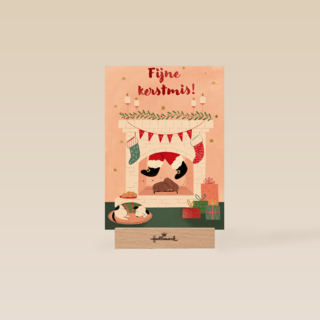 kerstkaart met kerstman in schoorsteen