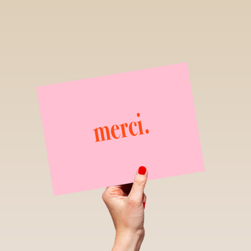 merci op roze achtergrond