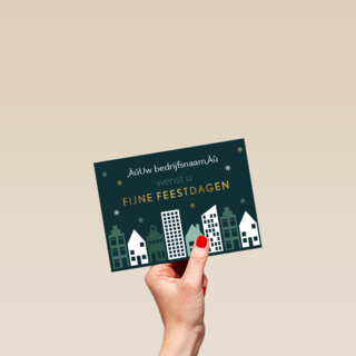 kerstkaart met een stad tijdens de nacht
