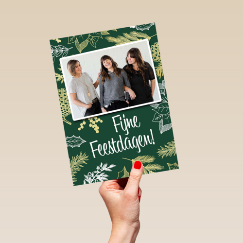 kerst zakelijk fotokaart met bladeren op groen