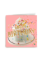 Een taart met confetti en Happy Birthday