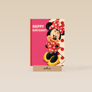 minnie mouse in jurk met rode stippen