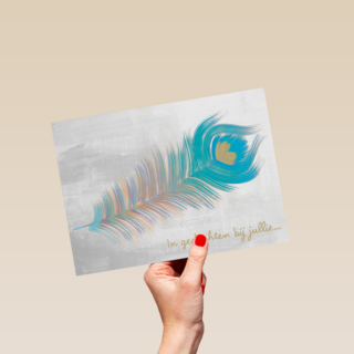 een hele mooie blauw pauwenveer in gedachten bij jullie