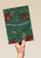 kerstkaart met kerststrikken op groene achtergrond
