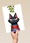 grumpy kat under the mistletoe