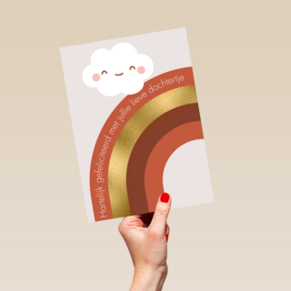 Regenboog met een lachend wolkje