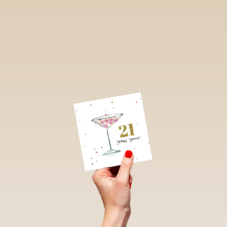 21 years young with a pink cocktail